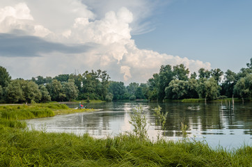 Novi Sad, Serbia - August 17, 2015: Fisherman on the artificial lake near the town of Novi Sad 