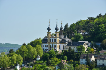 Obraz premium The pilgrimage church Kaeppele on a hill in Wuerzburg on a sunny day