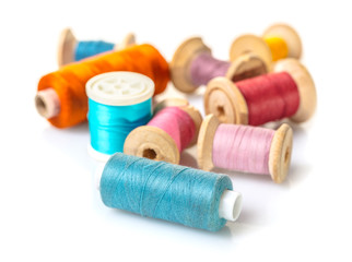 coils with colorful thread