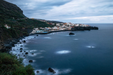 Fototapeta na wymiar View towards Los Aguas village in dusk with illumination, Tenerife Island, Canary Islands, Spain