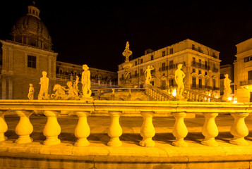 Fountain of shame on  Piazza Pretoria at night, Palermo, Italy