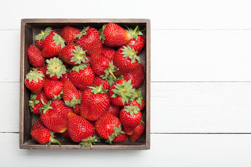 Crate, box with fresh strawberry. Copy space for text.