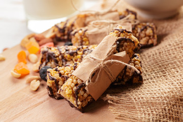 Granola bar on wooden background
