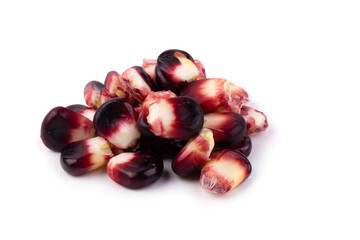 Fresh purple corns isolated on a white background