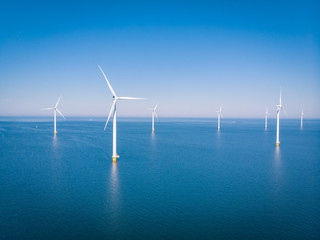 drone view at an windmill farm at sea