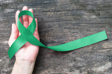 Kelly green ribbon awareness symbolic concept raising awareness on people living with Gallbladder...