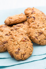 Chocolate oatmeal cookies on the  wooden background.