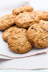 Chocolate oatmeal cookies on the  wooden background.