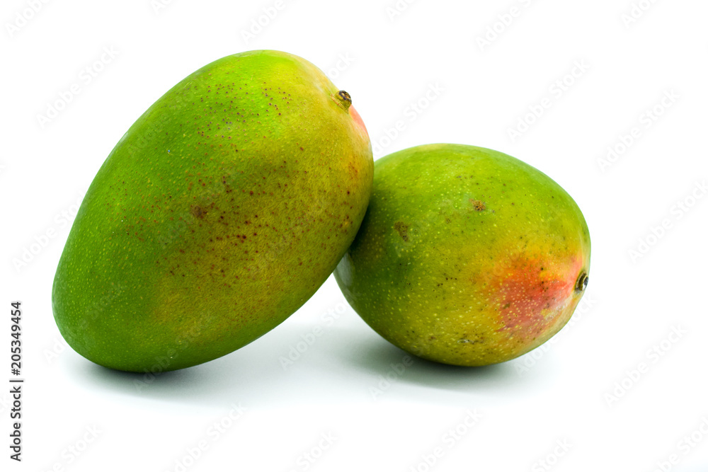 Wall mural mango isolated on white background, two mango fruits green