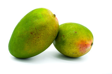 mango isolated on white background, two mango fruits green