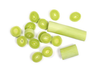 Fresh leeks, pile isolated on white background, top view
