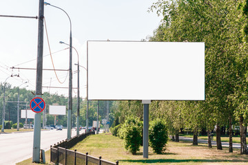 Billboard, billboard, canvas billboard, layout on the background of the city. The concept of outdoor advertising, marketing, sales. mockup