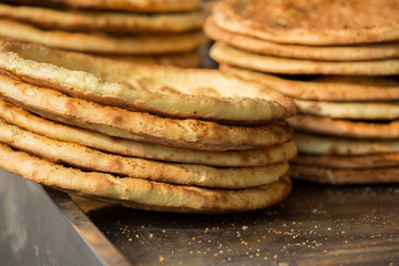 bunch of naan flat breads closeup
