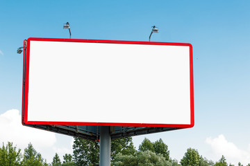 Billboard, billboard, canvas billboard, layout against the blue sky. The concept of outdoor advertising, marketing, sales. mockup