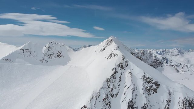 Aerial reveal shot of Alps over Pitztal glacier in Tyrol, Austria