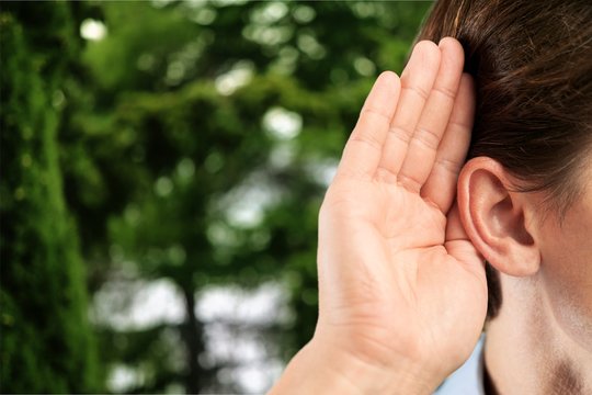 Man ear listening concept