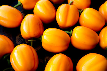 Group of plastic fake yellow Bell peppers.