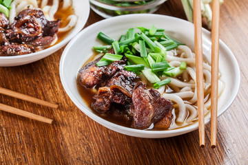 Japanese Udon noodles with beef, green onion and soup
