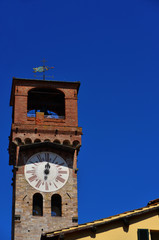 Lucca medieval 'Torre delle Ore' (Clock Tower), in city historic center (with copy space)