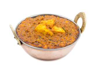 Indian Vegetarian Cuisine Kadai Paneer Also Know as Kadhai Paneer or Karahi Paneer is an Indian Dish of Marinated Paneer Cheese Served in a Spiced Gravy isolated on White Background