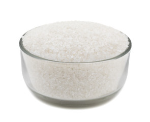 White Sugar in Glass Bowl isolated on White Background