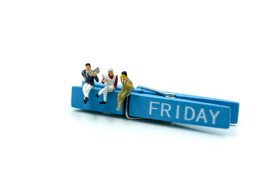 Miniature people : people feeling and sitting on list of friday.
