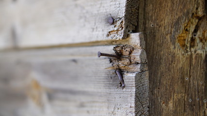 nail hooked old wooden wall