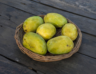 Mango Fruit on Wooden Background
