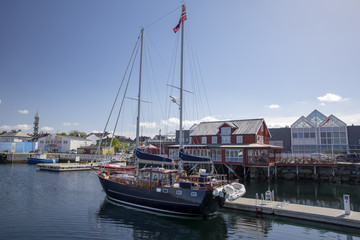 Sailboat in Bronnoysund harbor in Northern Norway