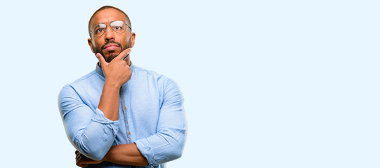 African american man with beard doubt expression, confuse and wonder concept, uncertain future...