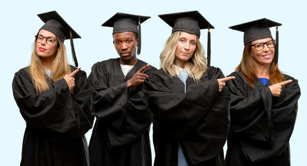 Education concept, university graduate woman and man group pointing away side with finger