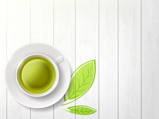 White cup with herbal green tea
