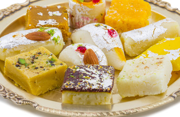 Indian Delicious Mix Sweet Food or Mix Mithai isolated on White Background