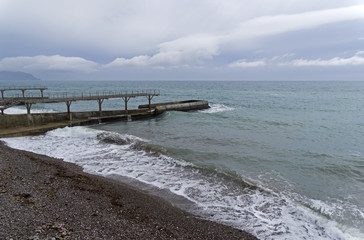 Empty beach in bad rainy weather. Crimea.