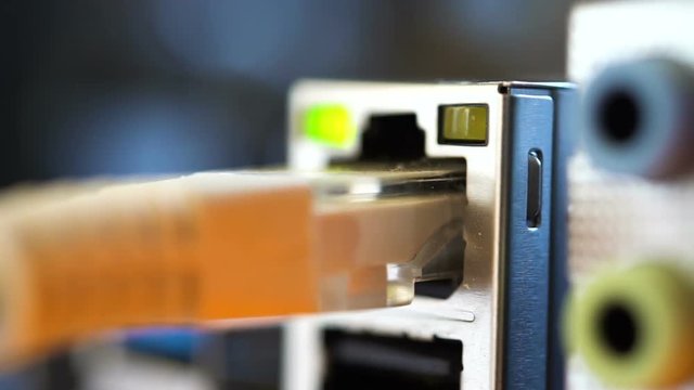 Ethernet port and other ports for connection of devices to the motherboard. Close view.