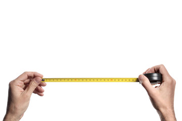 man's hand holding a tape measure on white background with clipping path and copy space