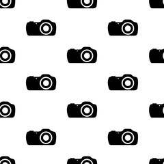 Seamless pattern with black cameras.