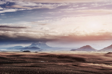 Beautiful landscape of mountain in Iceland with volcano in the background