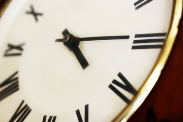 Closeup of classical clock, Roman numerals clock