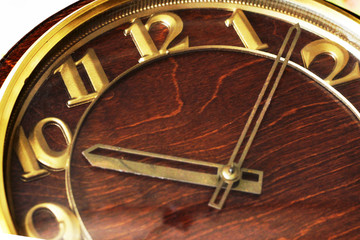 Fototapeta na wymiar Ancient clock with gold dial
