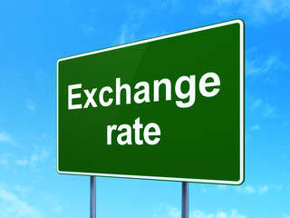 Currency concept: Exchange Rate on green road highway sign, clear blue sky background, 3D rendering