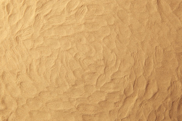 Sand texture background. Sand on beach with finger prints texture or pattern.