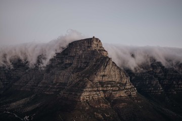 Clouds rolling over Table Mountain at sunset, Cape Town