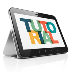 Education concept: Tablet Computer with Painted multicolor text Tutorial on display, 3D rendering
