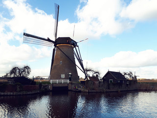 Traditional windmills over blue sky