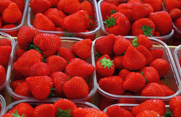 Close up red ripe strawberry on retail display