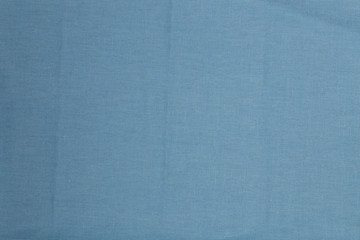 Petrolfarbener Stoff als Hintergrundstruktur