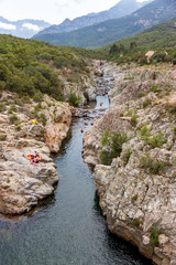 GALERIA, CORSICA - SEPTEMBER 2013: People Swim In The River Fango
