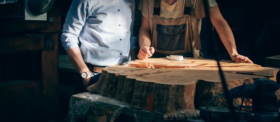 manufacture of furniture from solid wood. Discussion of the project of the customer and the master of the artisan.