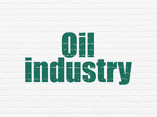 Industry concept: Painted green text Oil Industry on White Brick wall background